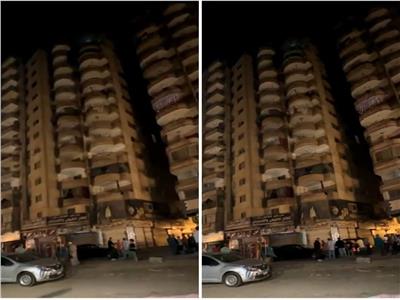 به شروخات وتصدعات.. إخلاء برج سكني آيل للسقوط في الجيزة