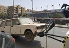  انتشار مكثف لرجال المرور بشوارع الجيزة ورفع 25 سيارة من الطرق 