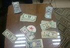 ضبط دولارات مزورة بمطار القاهرة قبل بيعها في الأسواق 