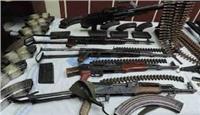 ضبط أسلحة ومخدرات وهاربين من أحكام في حملة مكبرة بالجيزة 