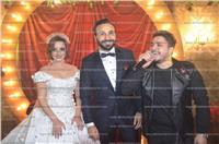 صور| العسيلي ومصطفى حجاج يغنيان لـ«أحمد وريهام» في زفافهما