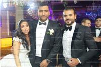 صور| سامو زين يغني «الورد الأحمر» لـ«إسماعيل وسوزان» في زفافهما