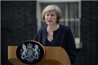 «ماي»: بريطانيا لن تقطع علاقاتها بالكامل مع روسيا