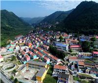 صور| «القرية الملونة» أشهر الوجهات السياحية في الصين
