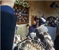 الرئيس الفرنسي يضع إكليلا من الزهور لشهداء الكنيسة البطرسية