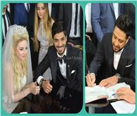 صور| حماقي يوقع على عقد قران علي جبر.. ويُحيي زفافه