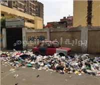 صور| قبل العيد.. أحياء بالقاهرة تحارب قمامة الشوارع الرئيسية وتبقي «الجانبية»