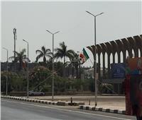 صور| أعلام الدول الإفريقية تُزين الشوارع المحيطة بإستاد القاهرة