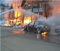 الدفع بـ10 سيارات إطفاء للسيطرة على حريق محلات بالهرم