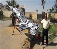 مجلس مدينة سوهاج يصنع طائرة مجسمة من الخردة