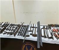 ضبط ١٢ متهمًا بإدارة ورش تصنيع الأسلحة النارية بأسيوط 