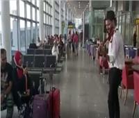فيديو| عازفو «كامنجا» ينشرون البهجة في مطار برج العرب