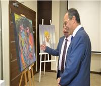  صور| الحاج علي يفتتح جناح للفن التشكيلي بمعرض الكتاب