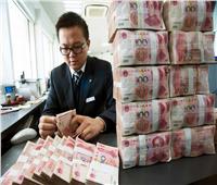 فيديو| الصين تعقم الأوراق النقدية في كافة البنوك بسبب فيروس كورونا 