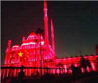 للتضامن ضد كورونا| إضاءة قلعة صلاح الدين ومعبد الكرنك بالعلم الصيني