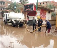 استمرار أعمال شفط المياه من شوارع الجيزة