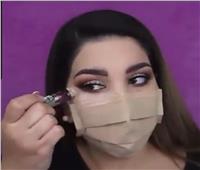 فيديو| فتاة تتحدى «كورونا» بوضع مكياج فوق الكمامة الطبية