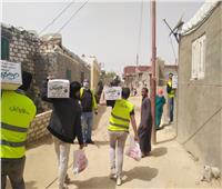توزيع مساعدات على 100 أسرة بقرية أبو المطامير 