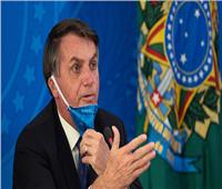 شكوى قضائية ضد رئيس البرازيل بسبب نزعه الكمامة بشكلٍ علنيٍ