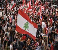 متظاهرون لبنانيون يرشون وزيرة العدل بالماء| فيديو