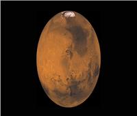 وكاله الفضاء الروسية تنشر صورة لحفرة على سطح كوكب المريخ 