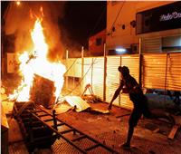 اشتباكات بين الشرطة والمتظاهرين في باراجوي بسبب إجراءات كورونا | صور وفيديو