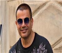 عمرو دياب يكشف تفاصيل منعه من السفر بسبب إصابته بفيروس كورونا | فيديو