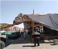 إزالة الاشغالات بمنطقة المحور المركزي بمدينة السادات| صور