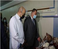 سفير فلسطين بالقاهرة يزور جرحى غزة بمستشفى معهد ناصر 