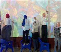 طلاب الفنون التطبيقية يشاركون في تجميل ميادين العاصمة الإدارية