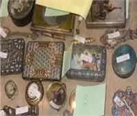 العثور على مجوهرات وأحجار كريمة وتحف أثرية داخل شقة بالزمالك 