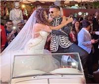 حسن أبو الروس في حفل زفافه على مصممة الجرافيك غادة والي | صور