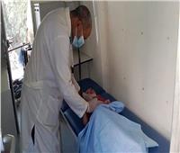 توقيع الكشف الطبي علي ٩٩٨ مريض بالقافلة الطبية بقرية كفر ربيع بالمنوفية