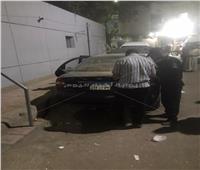 خبراء المفرقعات يفحصون سيارة مشتبه بها بجوار مكتب بريد نجع حمادي.. صور