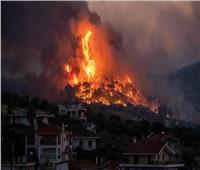 حرائق الغابات باليونان تهدد منشأت الطاقة الحيوية وتغلق الطريق السريع وتجلي سكان مدينتين