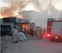 السيطرة على حريق في سوبر ماركت بنجع حمادي.. صور وفيديو