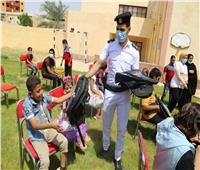 أمن الوادي الجديد يوزع 500 حقيبة مدرسية وهدايا عينية لذوي الهمم بـ 37 قرية