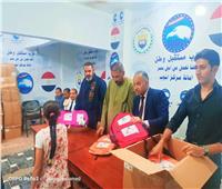 «مستقبل وطن أبنوب» يُهدي حقائب مدرسية لطلاب الأسر الأولى بالرعاية