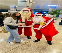 «بالهدايا والمفاجآت» مطار الغردقة يستقبل العام الجديد بالبهجة| صور