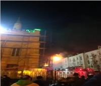 ننشر الصور الأولى لحريق عقار أمام مسجد الحسين 
