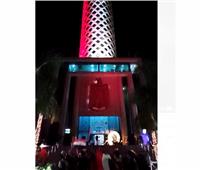 برج القاهرة يكتسي بألوان علم مصر تشجيعاً للمنتخب في المباراة الحاسمة|فيديو 