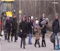 أوكرانيون يهرعون لنقاط العبور بعد إعلان موسكو فتح ممرات إنسانية
