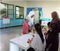توافد التونسيين على مراكز الاقتراع للاستفتاء على الدستور| صور