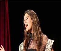 رولا زكي تغني «حلمنا كلنا» في افتتاح بطولة العالم للرماية