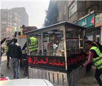 رفع 111 حالة إشغال وتحرير 16 محضر للمخالفين بالدقي | صور