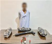 «الأمن العام» يضبط تاجر مخدرات بـ9 كيلو بانجو وسلاح ناري في أسوان
