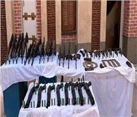 ضبط 28 متهمًا و34 قطعة سلاح ناري في حملة بأسيوط