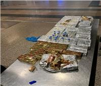 جمارك مطار القاهرة تضبط محاولتي تهريب مخدر الماريجوانا وعبوات دوائية |صور 