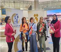 مطار القاهرة الدولي يحتفي بيوم المرأة العالمي مع المسافرات 