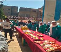 مدرسة إعدادية بنجع حمادي تنفذ مبادرة « أهلنا أولى» لتوزيع شنط رمضان